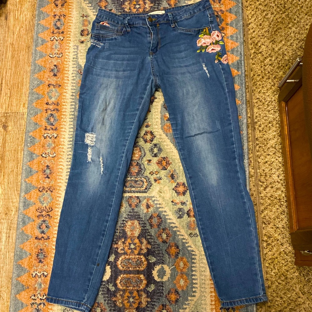 Floral patch distressed jeans